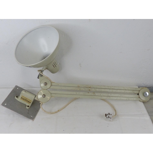104 - A large angle posie lamp with wall bracket.