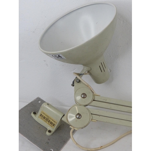 104 - A large angle posie lamp with wall bracket.
