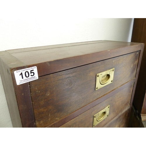 105 - A small oak chest of three drawers with brass pulls.