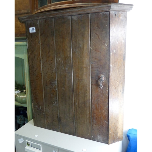 119 - An oak corner cabinet.