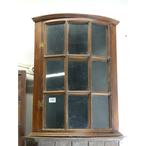 120 - A mahogany wall mounted corner cabinet.