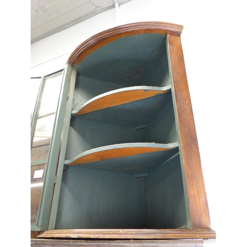 120 - A mahogany wall mounted corner cabinet.
