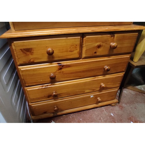 61 - Two pine chest of drawers.