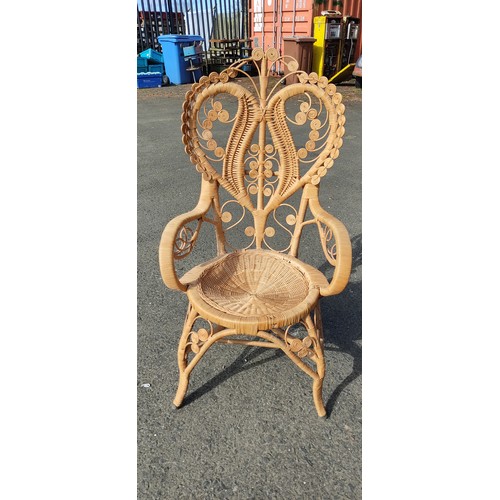 66 - A stunning vintage peacock chair.