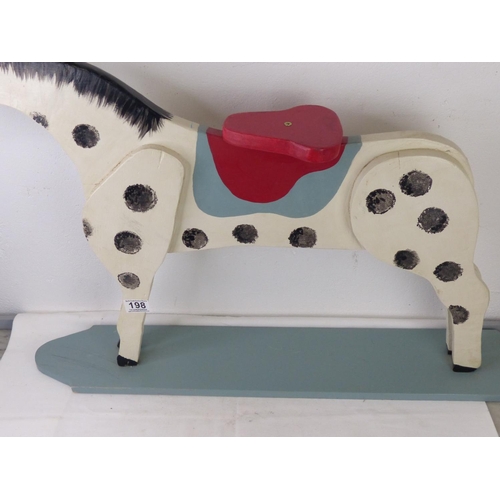 198 - A handmade wooden child's horse