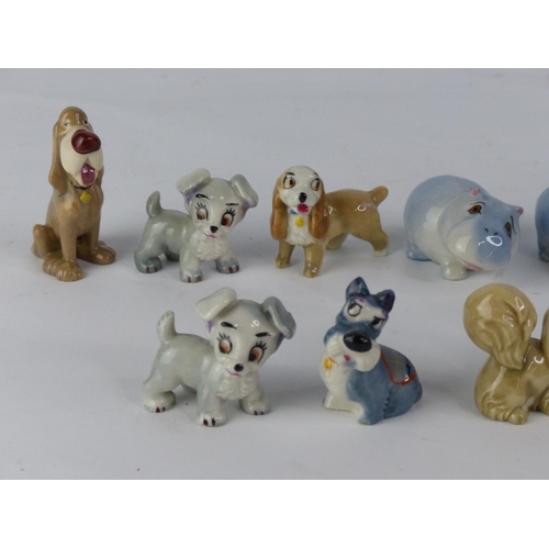 54 - A collection of Disney Wade figures.