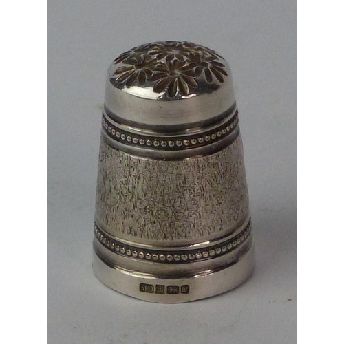 126 - A rare Sterling silver thimble depicting the Lord's Prayer on the thread from the needle.