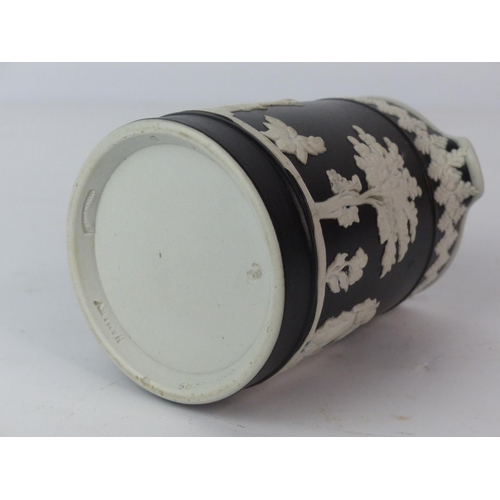 130 - A rare Hanley Brothers black glazed jug with Classical figures (a/f).