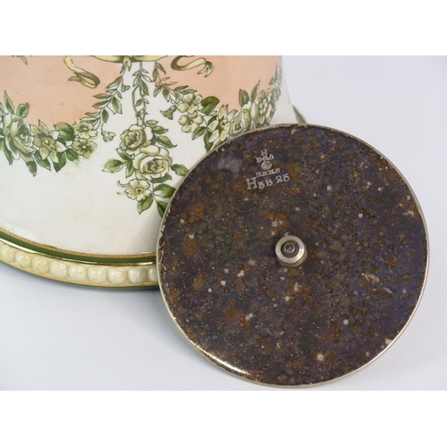 134 - An antique Doulton Burslem biscuit barrel with silver plated lid and handle.