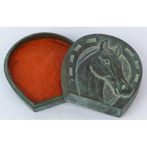 135 - A vintage copper trinket box in the style of a horse shoe.