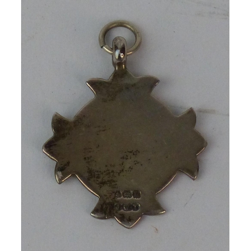 136 - A Sterling silver 'Londonderry FEIS' medal.