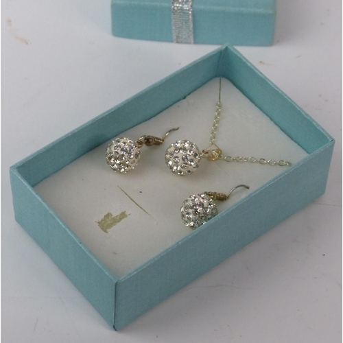 145 - A necklace and earring set.
