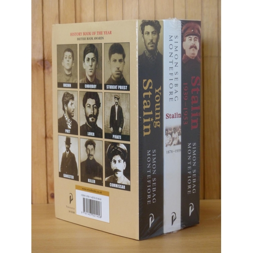 46 - An unopened pack of three books by Simon Sebag Montefiore 'Stalin'.