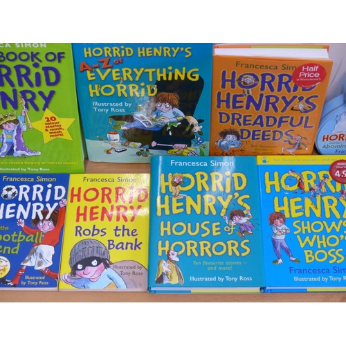 50 - Five hard backed Horrid Henry books, a Horrid Henry tin containing 3 CD's and two other books.