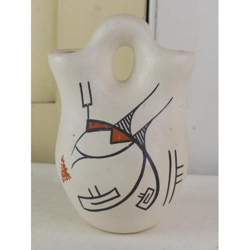 259 - An unusual pottery 'Wedding Vase' and paperwork, 12cm.