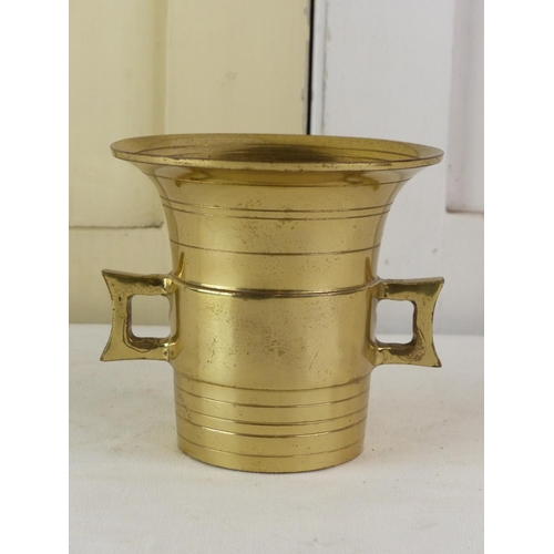 266 - A vintage brass Japanese mortar, 10.5cm.