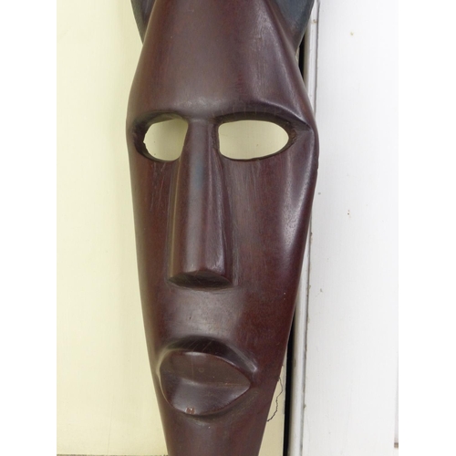 276 - An African style tribal mask, 55cm