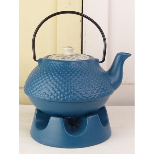 288 - A Jameson & Tailor 'Artists of the World' teapot and stand.