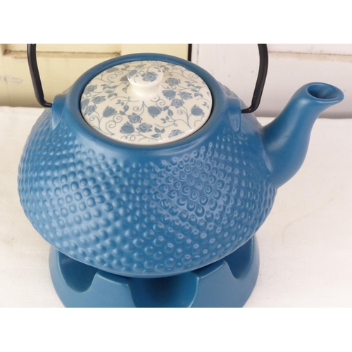 288 - A Jameson & Tailor 'Artists of the World' teapot and stand.