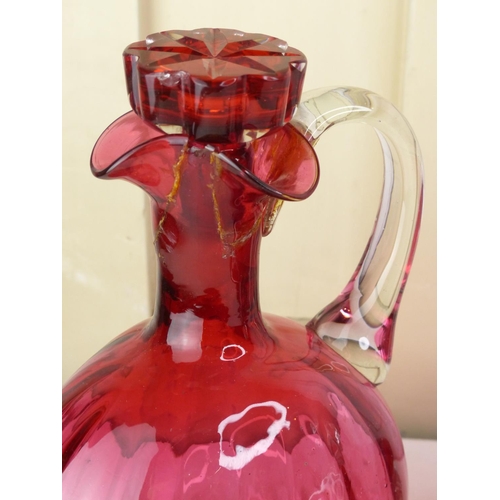 296 - An antique ruby glass decanter and lidded bowl (a/f).