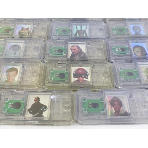 39 - A collection of Star Wars Phantom Menace Comm Talk Chips.