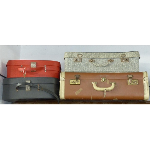 364 - A collection of 4 vintage/ retro suitcases.
