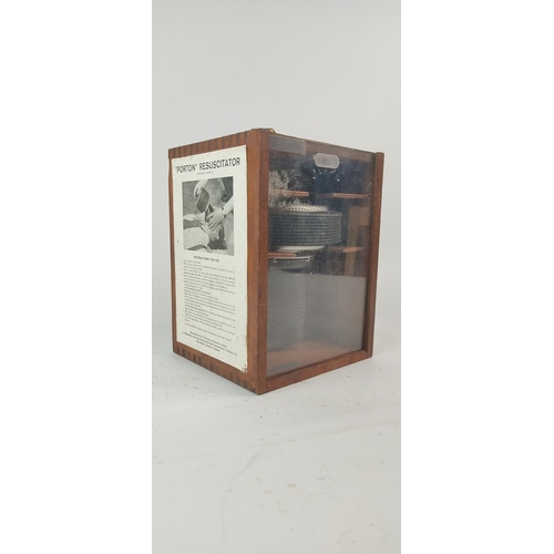 379 - A vintage cased 'Porton' Resuscitator.