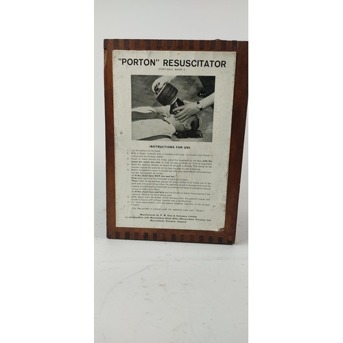 379 - A vintage cased 'Porton' Resuscitator.