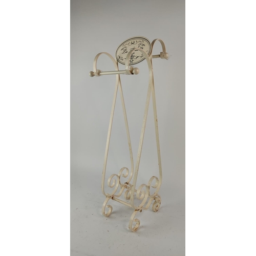 384 - A vintage style 'La Toilette' metal toilet roll holder.