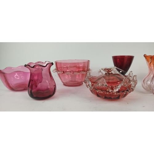 397 - A set of ten ruby and gilt glasses and other ruby glass.