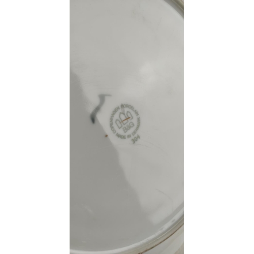 418 - A large assortment of ceramics to include cabinet plates & more.
