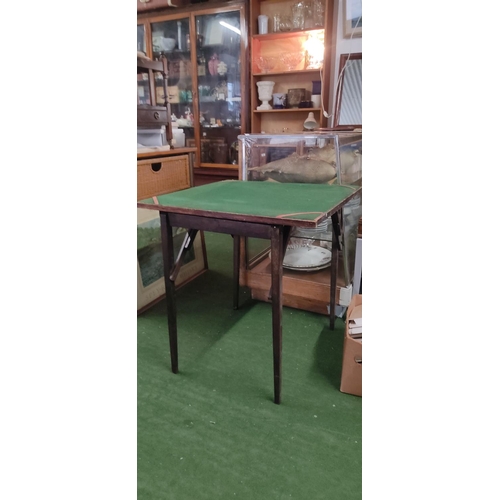 420 - An antique/ vintage folding card table.