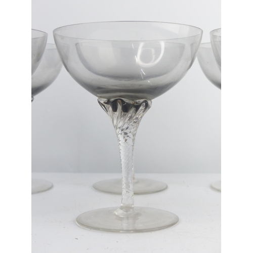 18 - A set of 6 vintage smoked glass Champagne saucers.