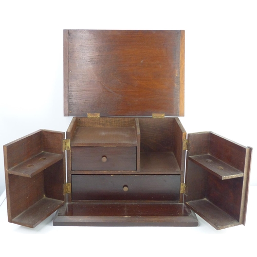 21 - A wooden Smokers cabinet. 21x32x22cm