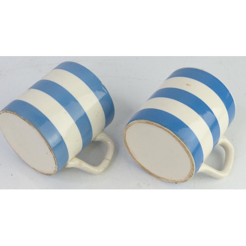 31 - A pair of vintage blue & white striped mugs.