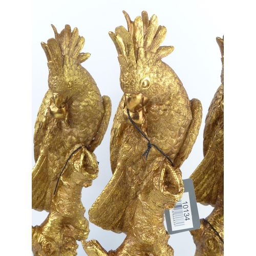 36 - A collection of 4 large gilt Cockatiel/ bird figures, measuring 37cm tall.