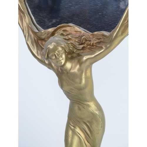 49 - An Art Nouveau style freestanding mirror, 34cm.