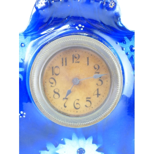 5 - A large antique ceramic cased mantle clock. 33cm tall