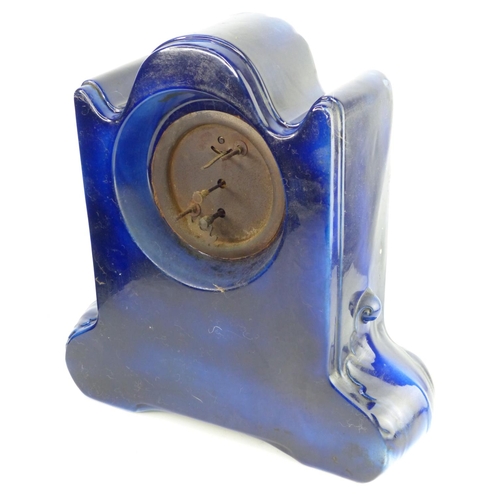 5 - A large antique ceramic cased mantle clock. 33cm tall