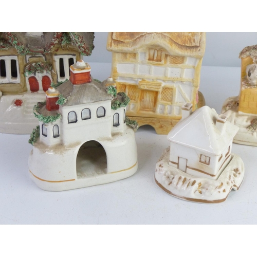 58 - A collection 5 antique pastille burners, modelled as houses.