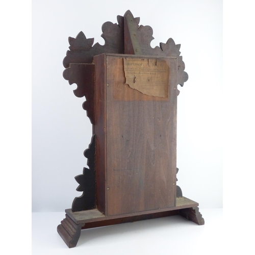 6 - An antique Gingerbread/ schoolhouse clock. 58cm tall