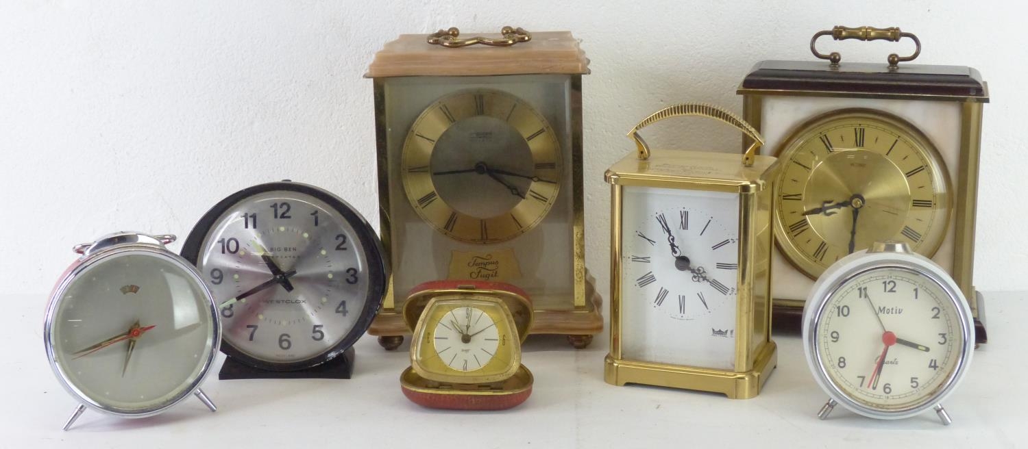 A collection of vintage clocks.