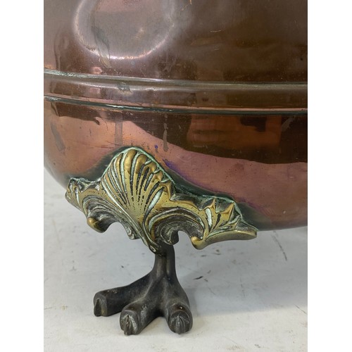 3 - An antique copper & brass urn. 43cm