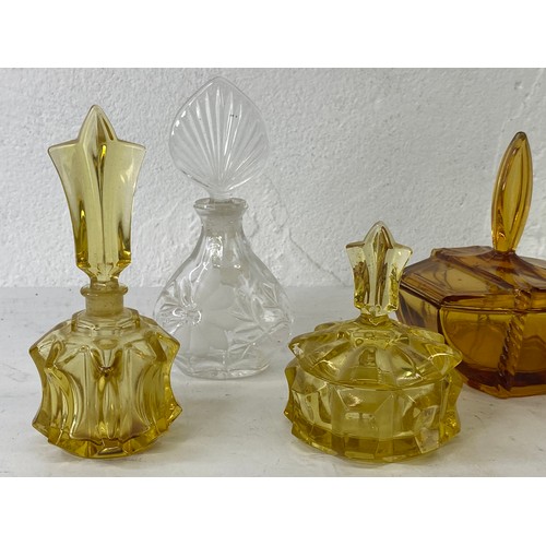 14 - A collection 6 vintage/ antique coloured glass dressing table bottles/ jars.