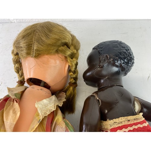 41 - 2 antique/ vintage dolls. Measuring 63cm and 33cm tall.