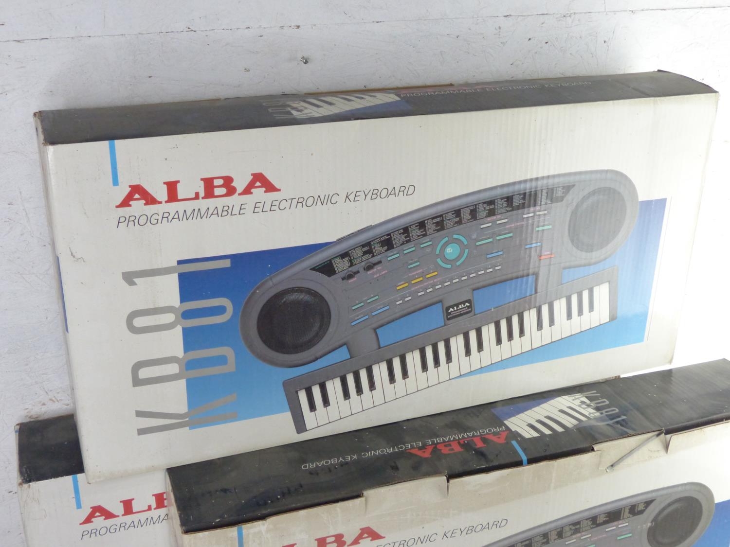 Three boxed Alba programmable electronic keyboard - KB81 (untested).