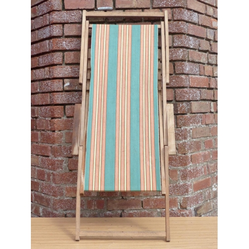 10 - A vintage wooden deck chair
