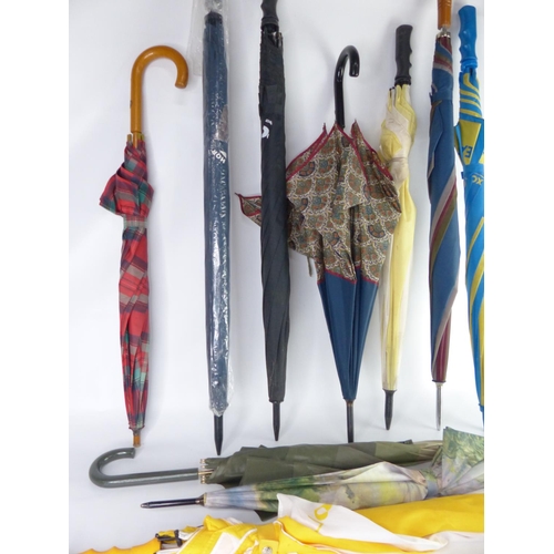 16 - A lot of assorted umbrellas.