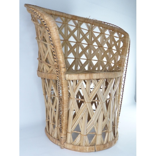 17 - A vintage/ retro rattan chair.