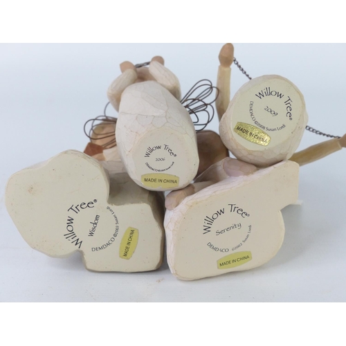 30 - A collection of four Willow Tree figures.